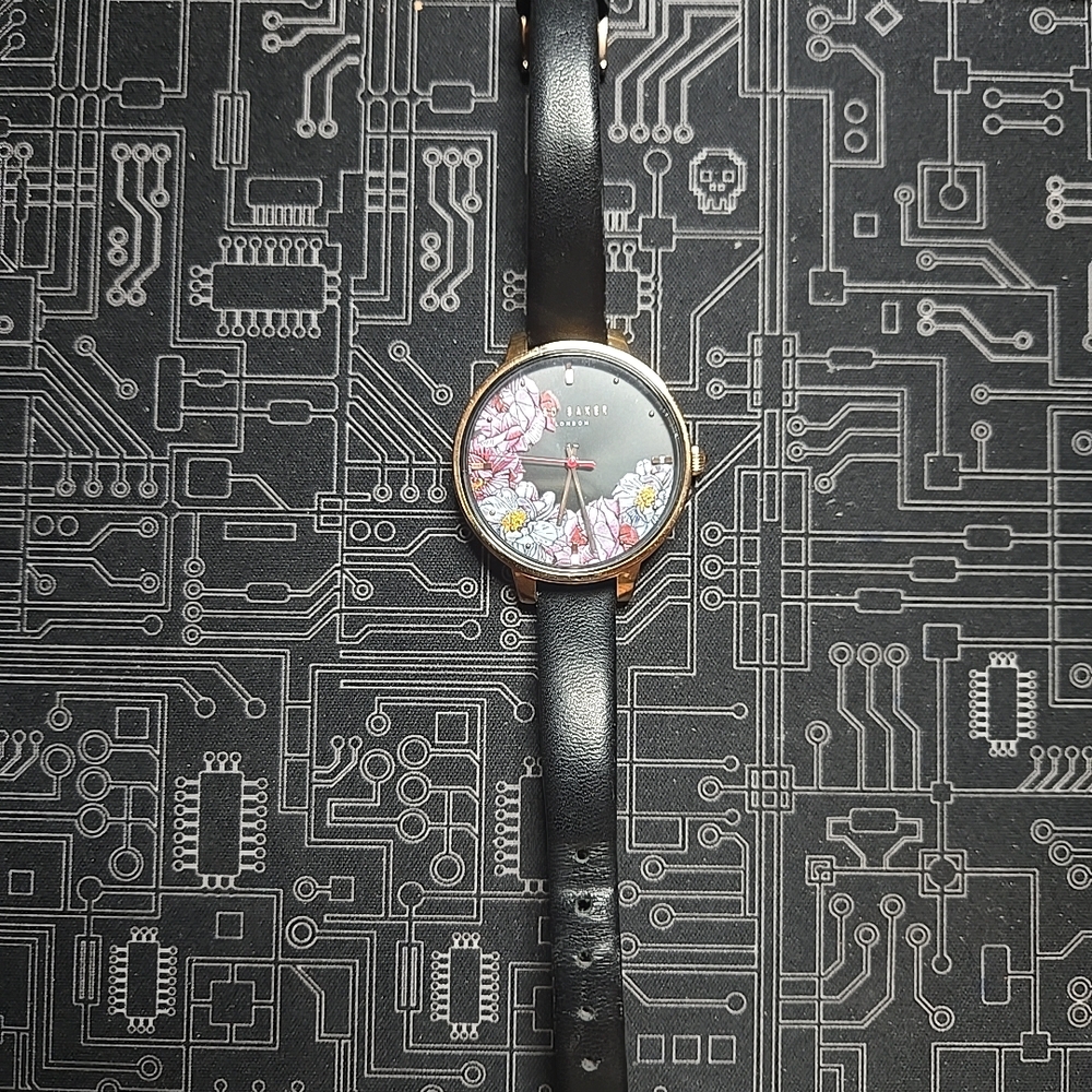 Ted Baker London Black and Gold Floral Watch Read Description